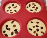 Foto del paso 6 de la receta: Budines de pan y calabacín con pasas