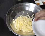 A picture of step 1 of Aloo Ke pakoray.