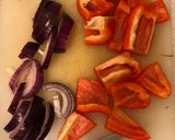A picture of step 5 of Farm shop wild boar and venison sausages on ratatouille.