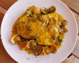 Foto del paso 8 de la receta Merluza y almejas en salsa de azafrán y cúrcuma