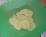 Foto del paso 2 de la receta: Pescadilla al horno con patatas, cebolla y calabacín