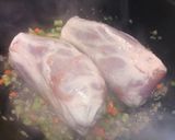 A picture of step 1 of Pork hock with in season asparagus sauce.