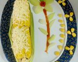 A picture of step 4 of CHEESY BUTTERI CORN on COB.
