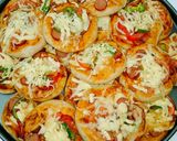 صورة لخطوة 4 من وصفة مينى بيتزا 🍕