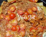A picture of step 6 of Cannelloni with Bolognese.