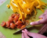 A picture of step 1 of Eggy bread with sweet pepper and tomato.