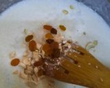 A picture of step 7 of Nolen gurer payesh or Rice kheer with date palm jaggery.