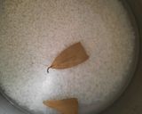 A picture of step 2 of Nolen gurer payesh or Rice kheer with date palm jaggery.