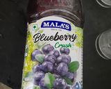 A picture of step 4 of Blueberry milk shake😋.