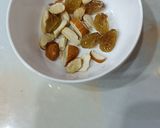 A picture of step 4 of Curd Lassi with dry fruit.
