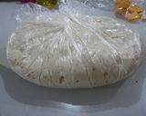 A picture of step 5 of Suprisingly Puffy Focaccia in a Plastic Bag.