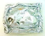 A picture of step 5 of Chicken and Vegetables Baked in Foil.