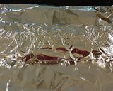 A picture of step 5 of Baby Back Pork Ribs, Oven Roasted and Fall Off the Bone Tender.