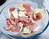 A picture of step 2 of Ham And Cheese Twisted Puff.
