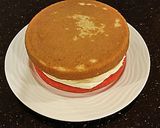 A picture of step 11 of Vanilla Christmas Layer Cake with Creamy Vanilla Buttercream Frosting.