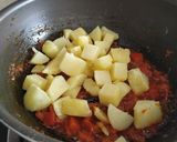 A picture of step 5 of "Aloo Tomato Curry".