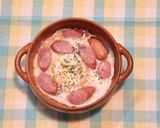 A picture of step 7 of Microwave Sloppy Egg & Wiener Sausages.