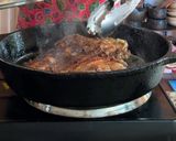 A picture of step 3 of Cambodian grilled chicken over rice.