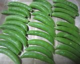 A picture of step 2 of Easy Sugar Snap Peas Baked in the Toaster Oven.