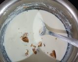 A picture of step 1 of Chickoo-chocochips icecream on white chocolate hearts.