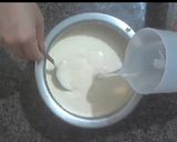 A picture of step 4 of Ghevar with rabri.