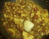 A picture of step 11 of Indian Home-style Curry with Potatoes and Chickpeas.