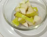 A picture of step 1 of Babugosha / Pear Chaat.