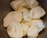A picture of step 4 of White Bread Rolls of Happiness Using Fresh Cream.