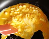 A picture of step 7 of Stir Fried Udon Noodles with Melting Cheese and Fluffy Eggs.