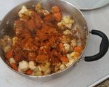 A picture of step 6 of My own version of Biryani ( with chicken & veggies).