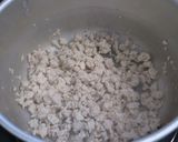 A picture of step 3 of Chinese Soup with Ground Chicken and a Whole Onion.