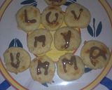 A picture of step 13 of Semolina cookies with chocolate syrup.