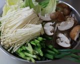 A picture of step 1 of Kimchi Hotpot with Kimchi Stock.