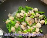 A picture of step 6 of Pan fried sea bream with sake braised clams and broccolini.