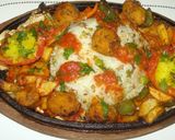 A picture of step 1 of Rice sizzler with tomato coulis.