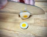 Foto del paso 3 de la receta Cestitas de gulas al ajillo con falso huevo de codorniz
