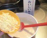 A picture of step 2 of Hot Milk Cheese Fondue with Mochi Cakes.