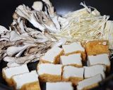 A picture of step 4 of Sauted Autumn Salmon, Mushrooms and Atsu-age Tofu with Soy Sauce.