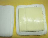 A picture of step 4 of For Bentos and Drinking Appetizers: Hanpen Sandwiches.