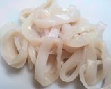 A picture of step 3 of Splatter-free Fried Calamari.
