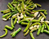 A picture of step 3 of Green Chilies Thecha.