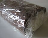A picture of step 14 of Cocoa Crepe Roll Cake with Whole Strawberries.