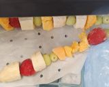 A picture of step 1 of Fruity 🍇🍎🍐🍒🍓🍌🍍🥝🍋🍊 frozen kebab skewers.😋😋.