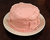 A picture of step 12 of Cherry Vanilla Layer Cake.