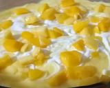 A picture of step 9 of Mango custard cake with green mango tree.