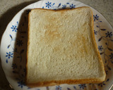 A picture of step 2 of Broccoli Egg Toast.