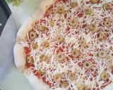 Une image de l'étape 5 de Pizza à la saucisse et tomate oignon.
