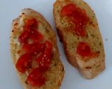 A picture of step 3 of My open toasted Garlic Cheese bread with ham + Tomato 🤩.