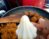 A picture of step 11 of Poornam kozhukkattai/ chana dal modak.
