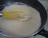 A picture of step 4 of Tarako Spaghetti with Fluffy and Creamy Sauce.